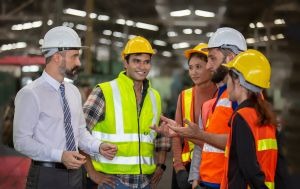 Group of industrial workers placed by a staffing company